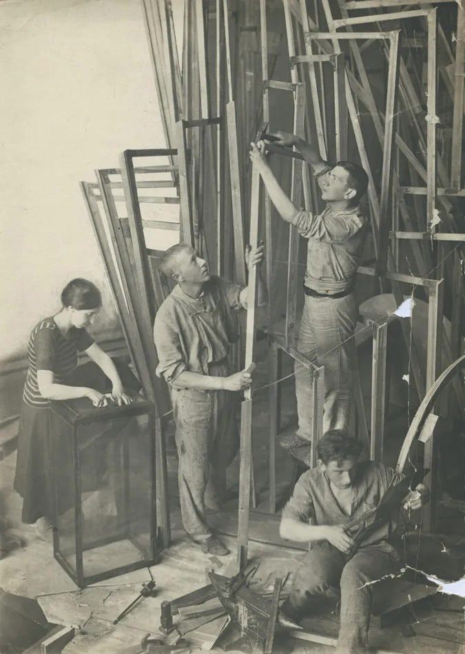 Workers creating a model of Tatlin’s tower.