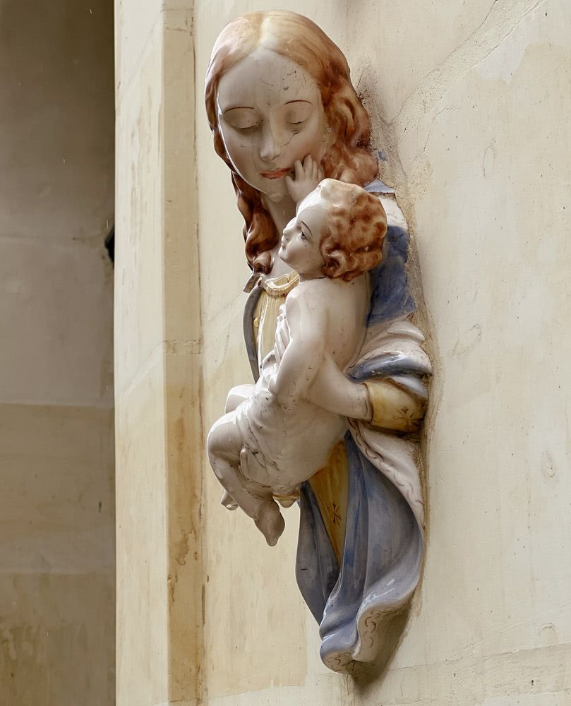 A figurine of mother Mary and baby Jesus