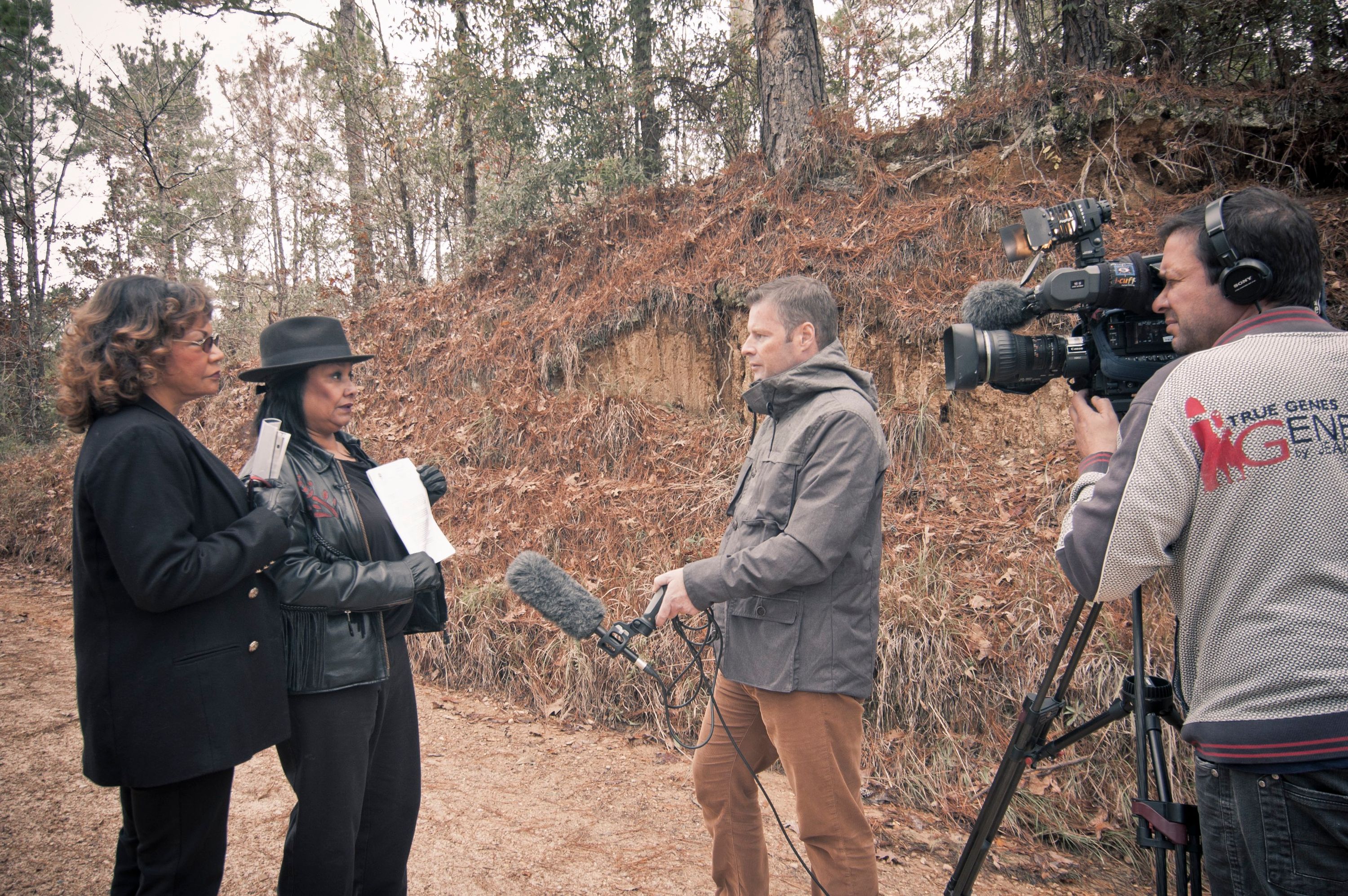 Shirley Walker Wright (left) and Catherine Walker Jones (right) stand together for interview by Al Jazeera America at the murder scene on Poor House Road. Photo by Ben Greenberg
