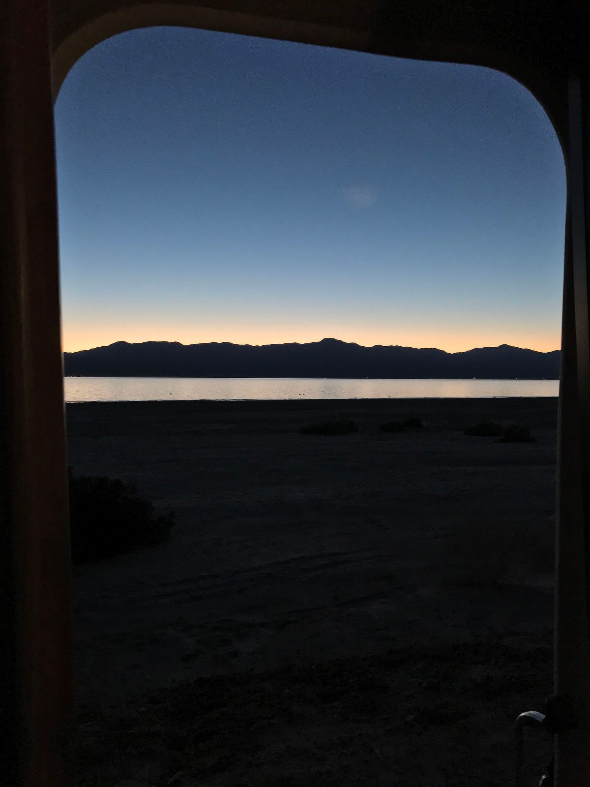 View out camper door of the Salton Sea (2017)