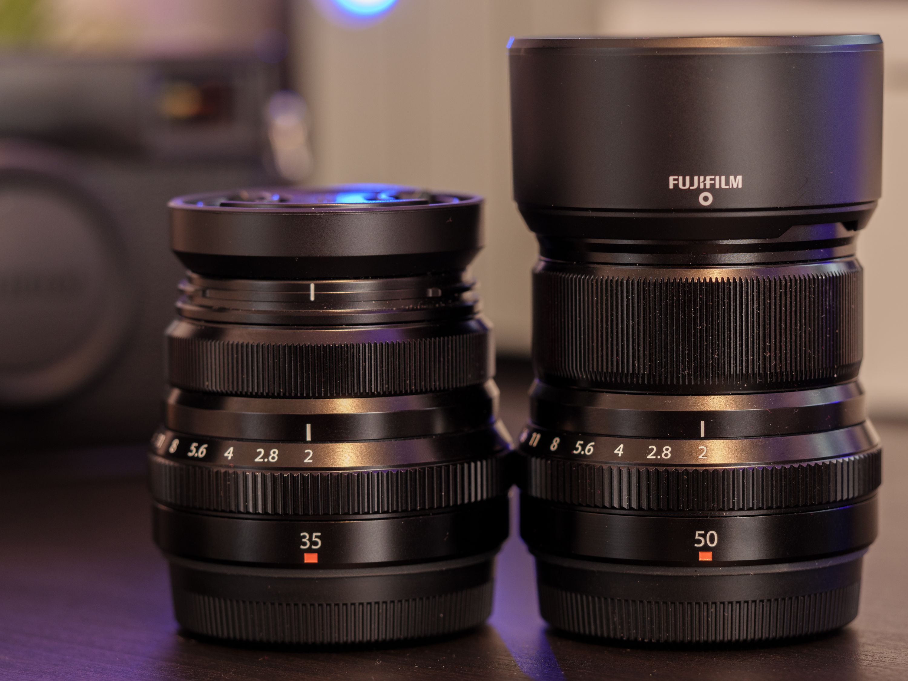The XF 35mm and 50mm ƒ/2 pair, shown with hoods attached.