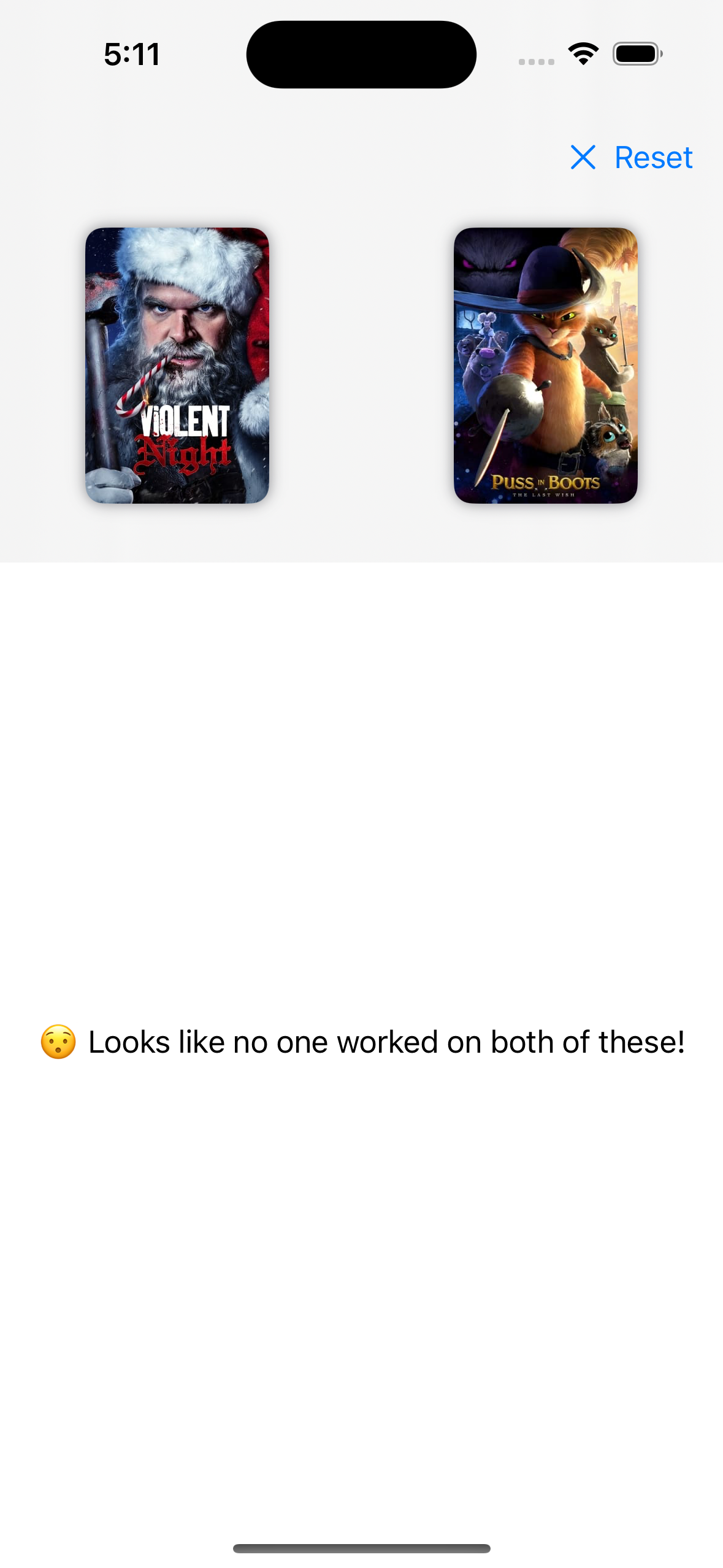 A screenshot of a comparison of the movies “Violent Night” and “Puss in Boots” showing that no one worked on both of these movies.