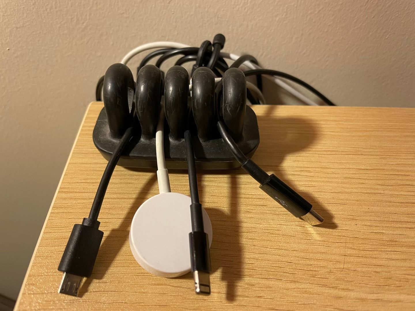 A close-up on the organizer for my charging cables.
