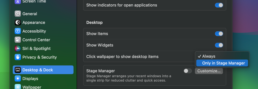 Screenshot of macOS System Settings with the “Desktop & Dock” option selected. Under the “Desktop” section there’s a setting named “Click wallpaper to show desktop items” with the dropdown showing “Always” and “Only in Stage Manager”.
