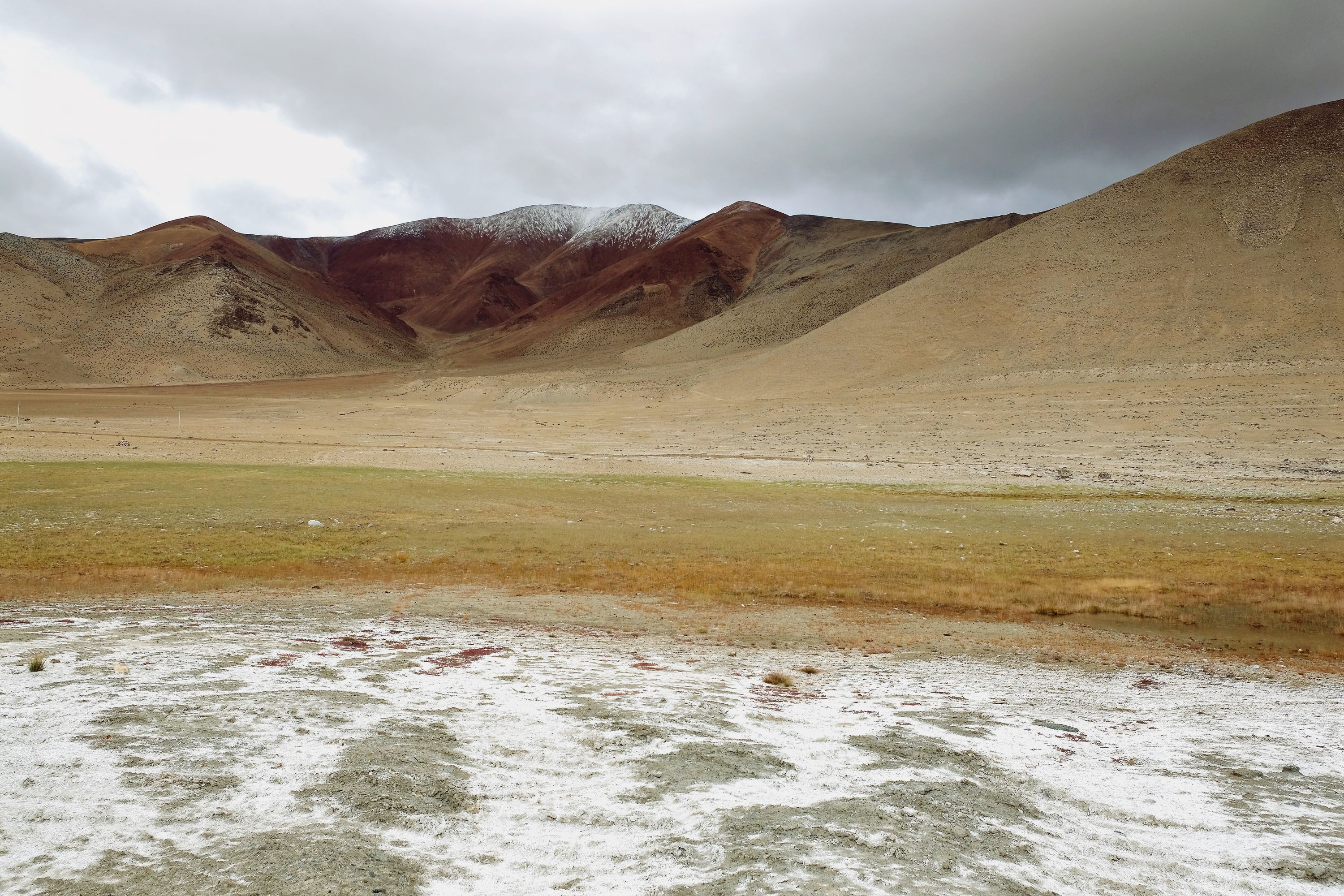 Snow over delicious-looking mountains in Ladakh, India. September 2021.