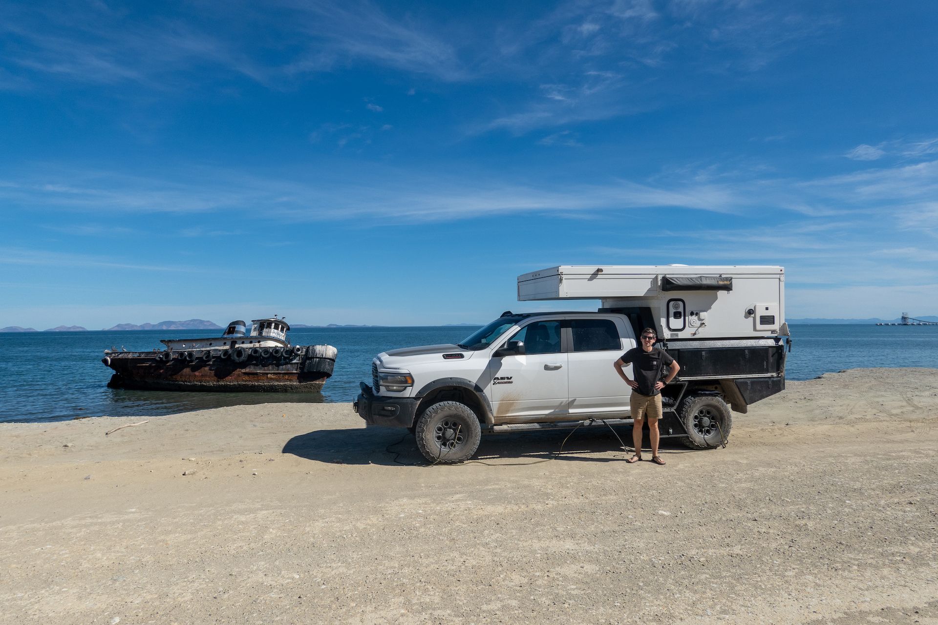 Airing down the tires next to an abandoned boat before starting the 80 kilometers of dirt road to San Evaristo