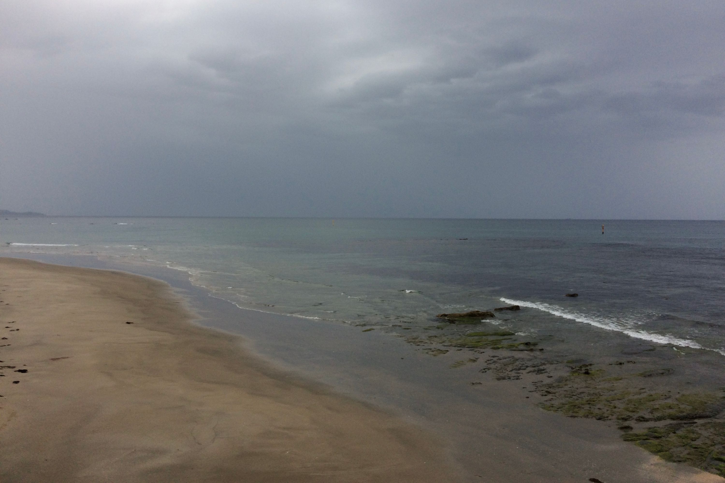 A gloomy morning on a Pacific beach.