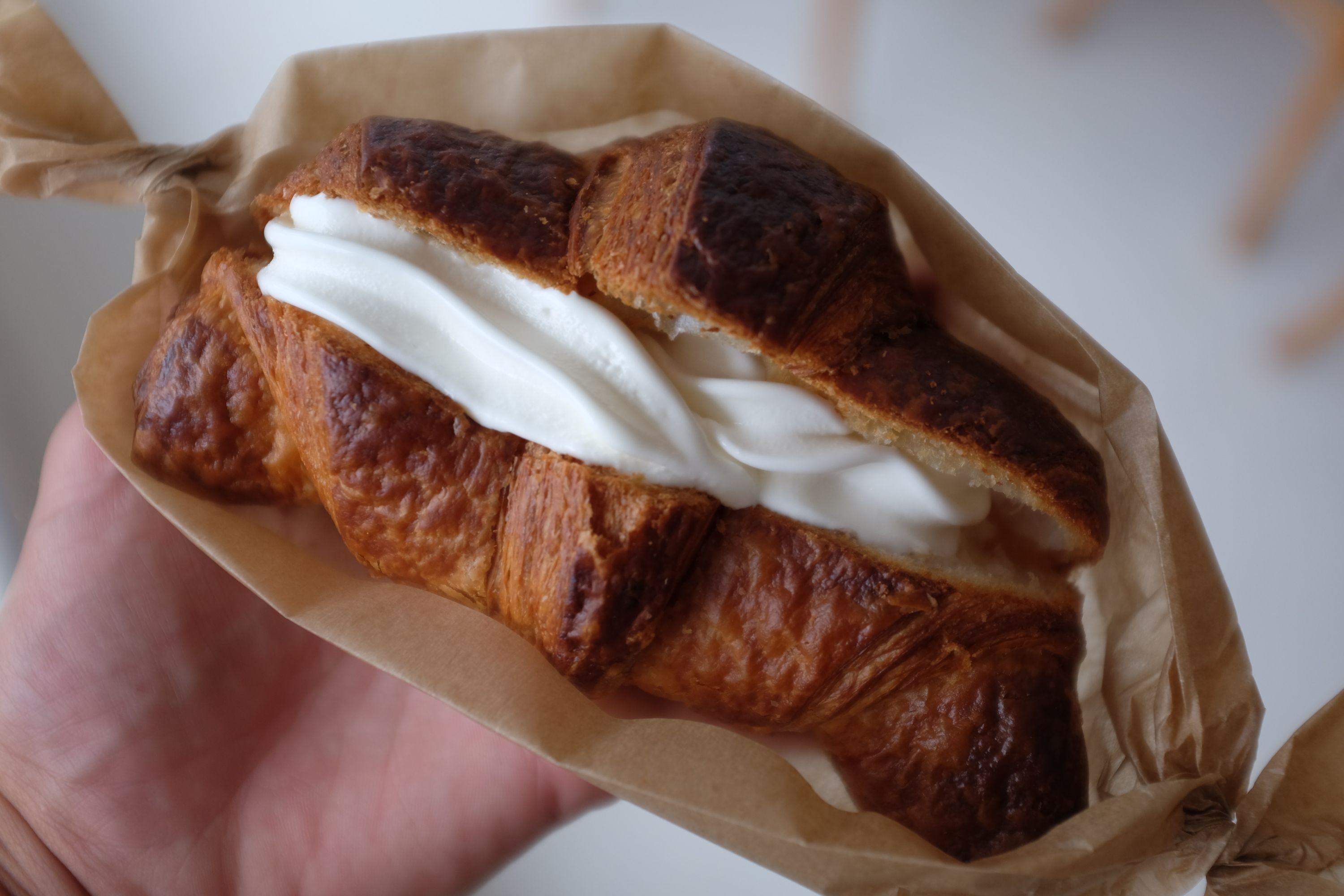 A croissant filled with ice cream.