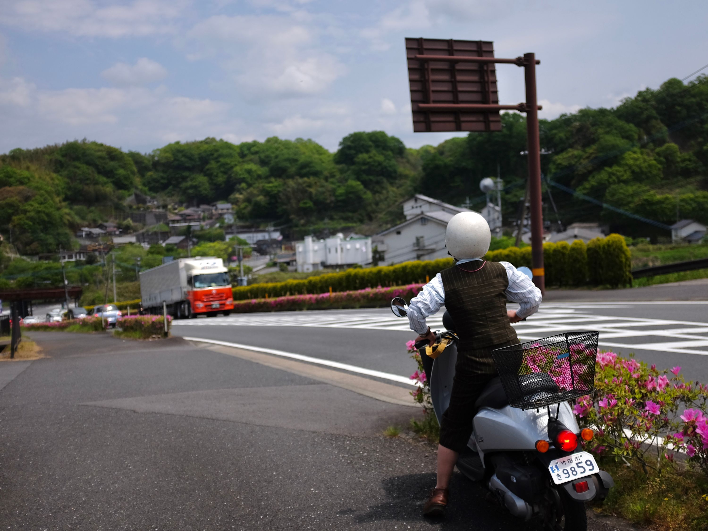 Woman on scooter in Taketa, Ōita. Photo: Peter Orosz
