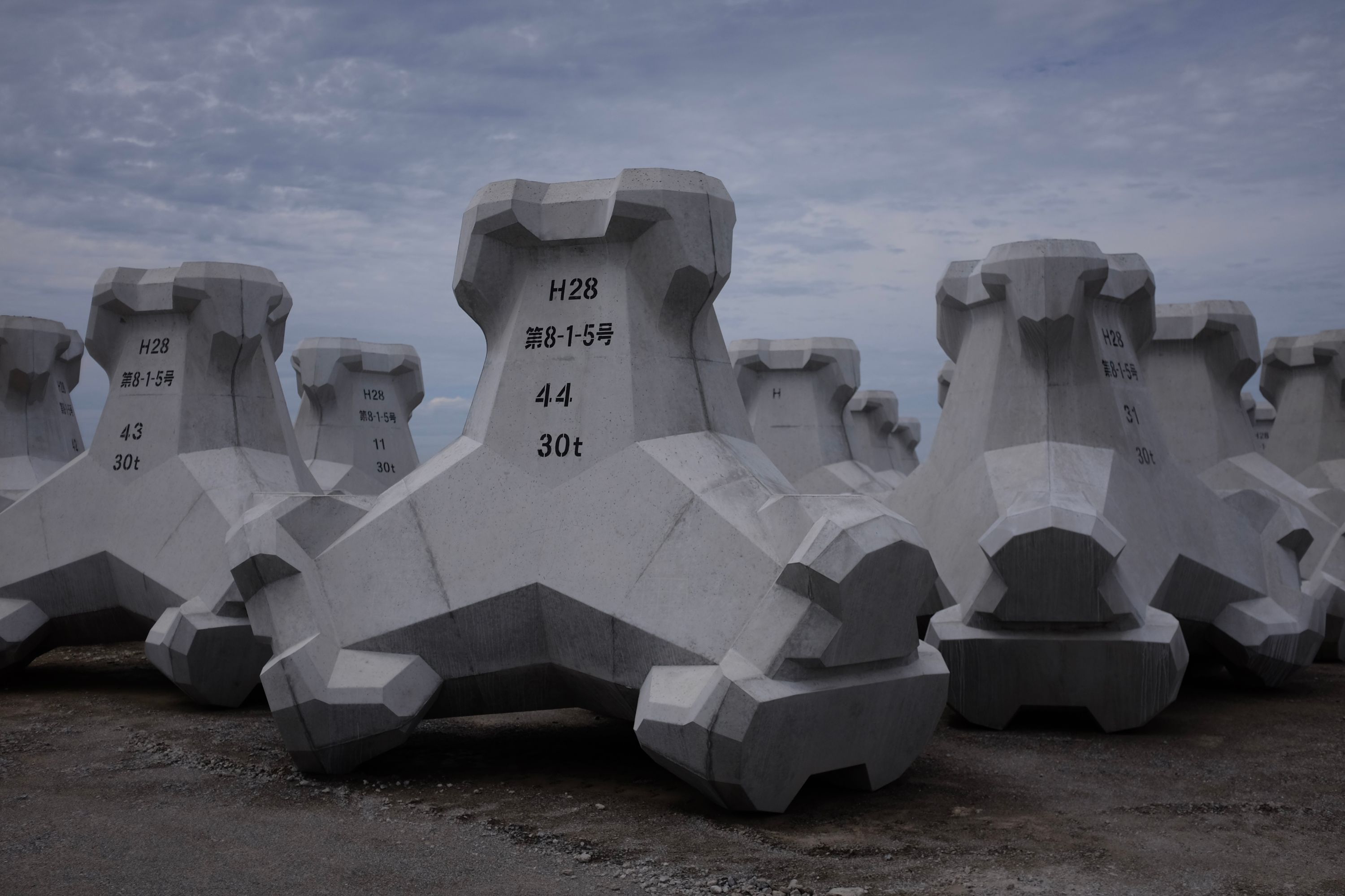 Newly cast 30-ton concrete tetrapods.